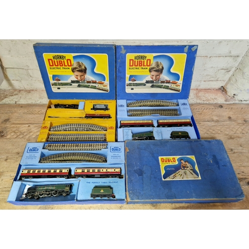 346 - Three Hornby Dublo 3-rail boxed train sets to include EDP11, EDP12 & EDG18.