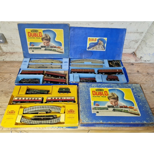 347 - Three Hornby Dublo 3-rail boxed train sets to include EDP2, EDP12 & one other.