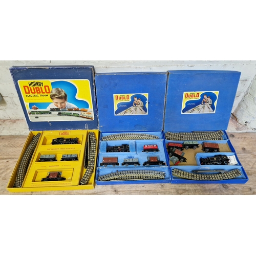 348 - Three Hornby Dublo 3-rail boxed train sets to include EDP16 & 2 x EDP17.