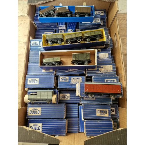 349 - A box of approx. 60 assorted Hornby Dublo boxed rolling stock items to include capaity wagon, tube w... 