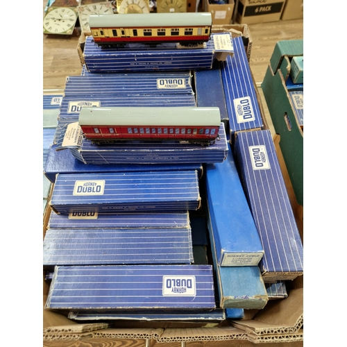 352 - A box of approx. 54 assorted Hornby Dublo boxed rolling stock items comprising D14 suburban coaches ... 