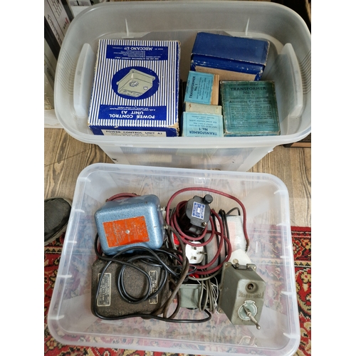 358 - Two boxes of assorted Hornby Dublo & Tri-Ang model railway power control units & transformers, some ... 