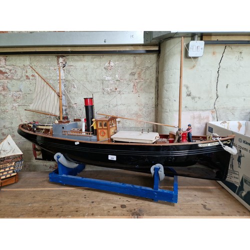 480 - A large model boat on stand, length is approx. 120cm.