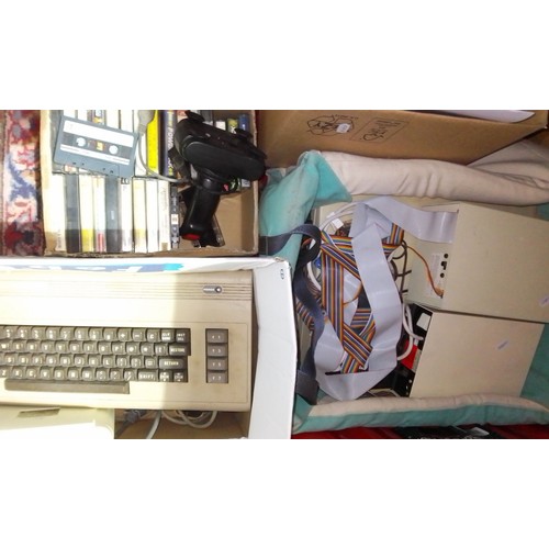 432 - A Commodore 64 computer with games and a BBC computer.