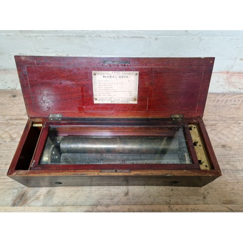 32 - A late 19th century rosewood cylinder music box, length 51.5cm.