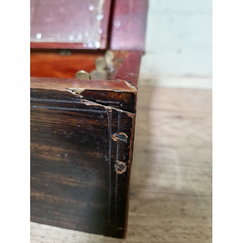 32 - A late 19th century rosewood cylinder music box, length 51.5cm.