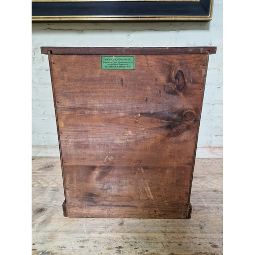 34 - A late Victorian specimen cabinet, interior drawers with arched glazed door, labelled 'Watkins & Don... 