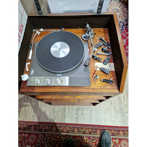 322 - A Garrard 401 turn table fitted in cabinet and a pair of KEF KIT floor standing speakers.