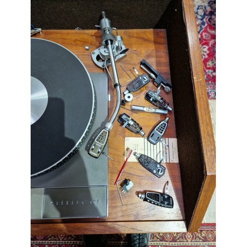 322 - A Garrard 401 turn table fitted in cabinet and a pair of KEF KIT floor standing speakers.