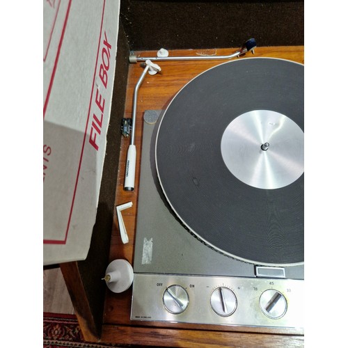 322 - A Garrard 401 turn table fitted in cabinet and a pair of KEF KIT floor standing speakers.