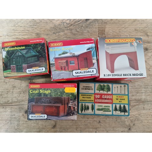 395 - Three boxes of assorted model railway including scenery, Hornby buildings and track.