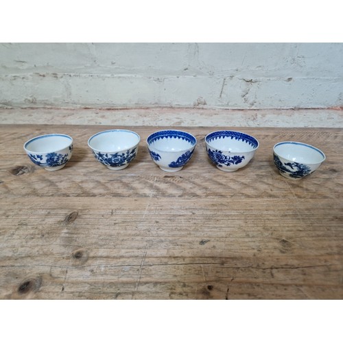 66 - A tray of assorted 18th century blue and white porcelain, the majority crescent marked Worcester and... 