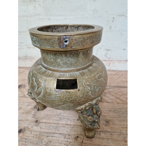 46 - A Chinese bronze incense burner, archaic mark to base, height 26cm, missing handles.