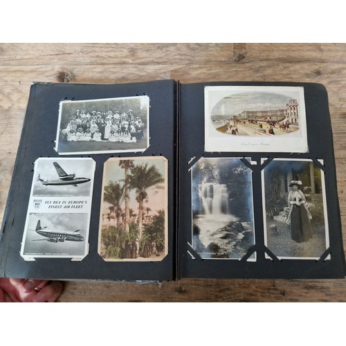 189 - Five albums of postcards and photographs, mainly early 20th century, various subject matter.