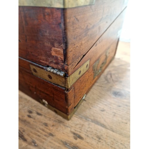 192 - A 19th century mahogany writing slope, campaign style with inset brass handles and brass inlaid corn... 