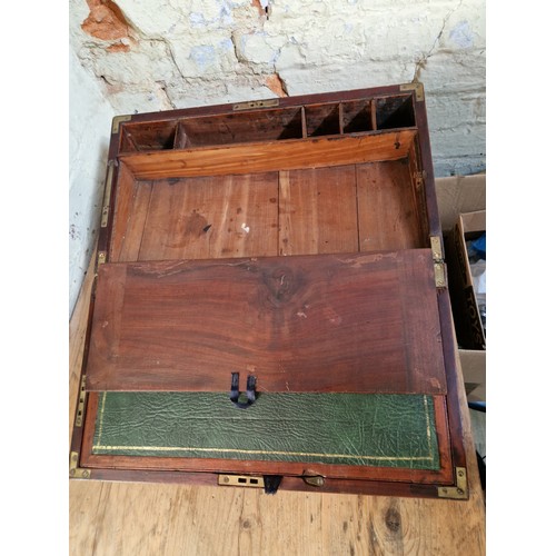 192 - A 19th century mahogany writing slope, campaign style with inset brass handles and brass inlaid corn... 