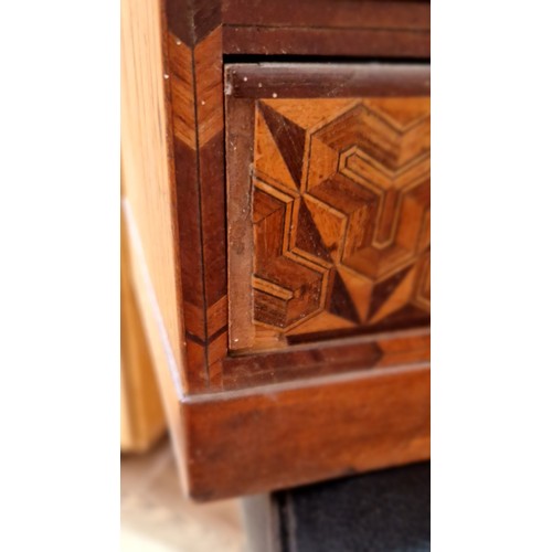 289 - A Japanese parquetry inlaid cabinet, height 36cm.