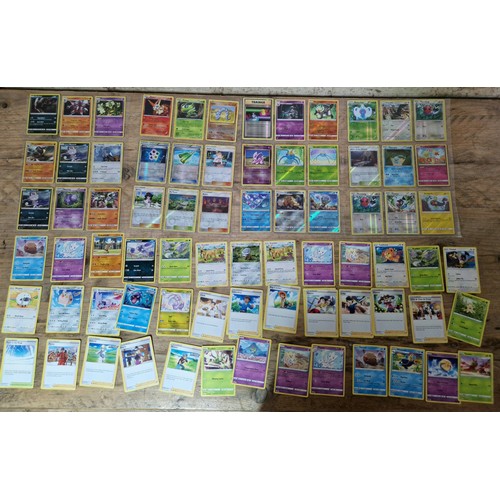 455 - A box of approx. 3450 Pokemon cards including holo's.