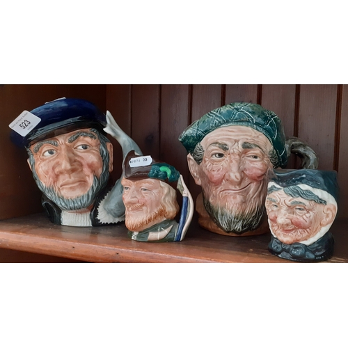 523 - Four Royal Doulton character jugs.