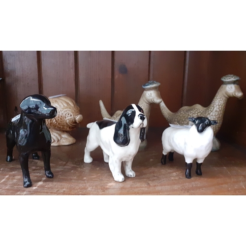 562 - 6 small Beswick figures. Black Labrador, Spaniel, sheep, White & Mackay Loch Ness Monster whisky con... 