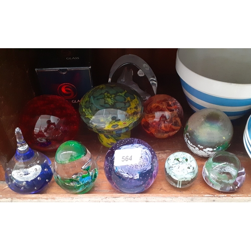 564 - 10 glass paperweights including a boxed Selkirk Glass ‘Ventura’, Phoenician, Mdina etc