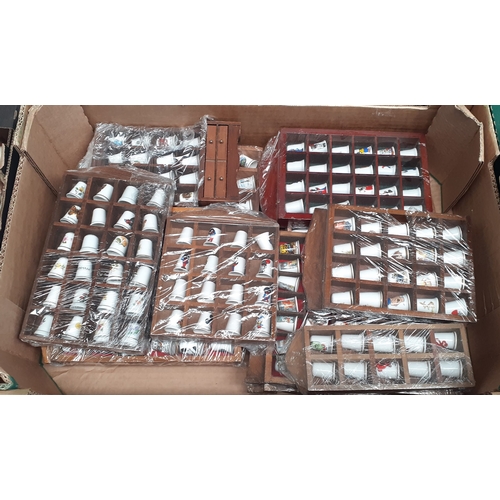 573 - 12 wooden display cases for thimbles with approximately 300 thimbles