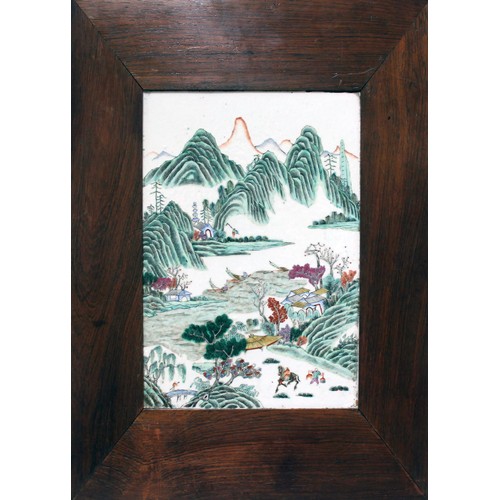 135 - A Chinese porcelain panel, circa 1900, over enamel decoration depicting a mountainous landscape with... 