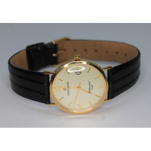 94 - A 9ct Sovereign wristwatch, case diam. 32mm, leather strap.