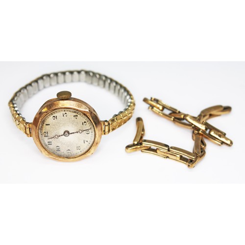 68 - A ladies 9ct gold Rolco wristwatch with strap marked '9ct', both as found.