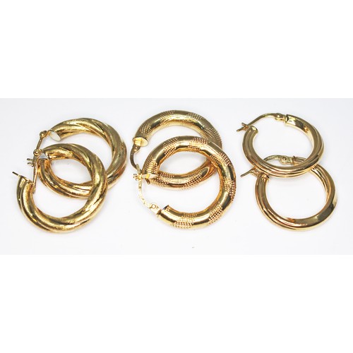 60 - Three pairs of 9ct gold hoop earrings, various marks, gross wt. 7g.