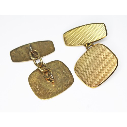 71 - A pair of hallmarked 9ct gold cufflinks, wt. 6.1g.