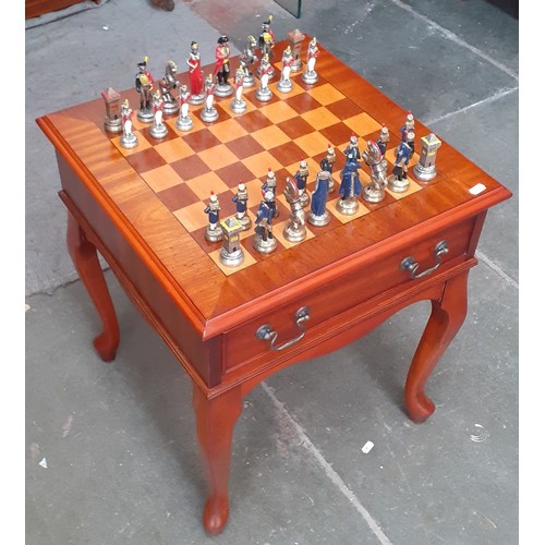 1020 - A mahogany chess table with Napoleonic style cast metal pieces together with a 1930s chair.