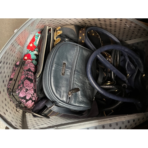 79 - A collection of ladies handbags and purses including River Island, Fossil, Mulberry, some leather, e... 