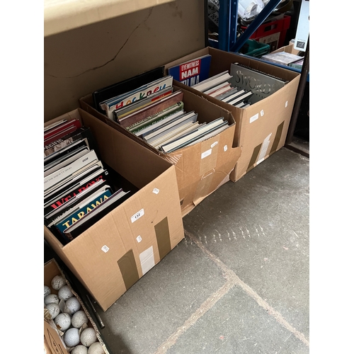 132 - 2 boxes of military books and 1 box of art and miscellaneous books.