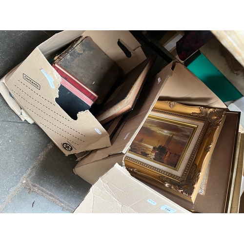 154 - Two boxes of pictures and books including an 18th century bible, monochrome prints etc.