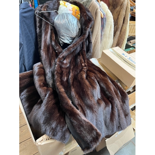 157 - A brown mink full length fur coat with matching hat.