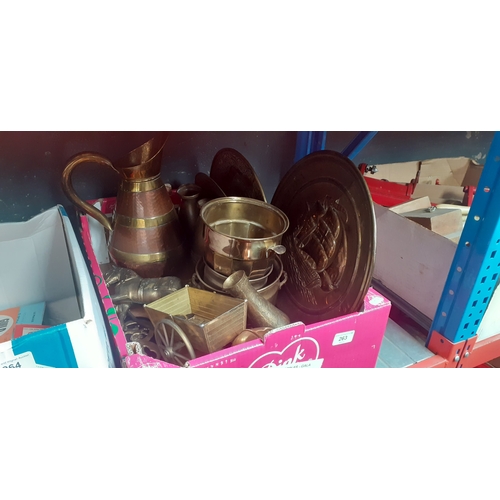 263 - A box of brass and copper ware.