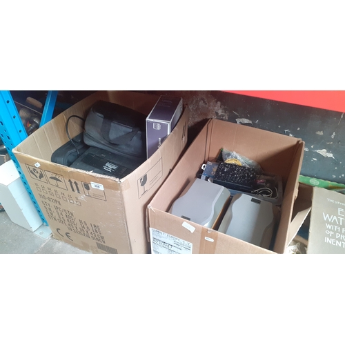 268 - 2 boxes of electrical items including radios, digital photo frame, a Sanyo CD player, etc.