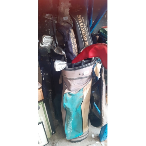 271 - 2 bags of golf clubs comprising Callaway, Cobra and a Ping putter.