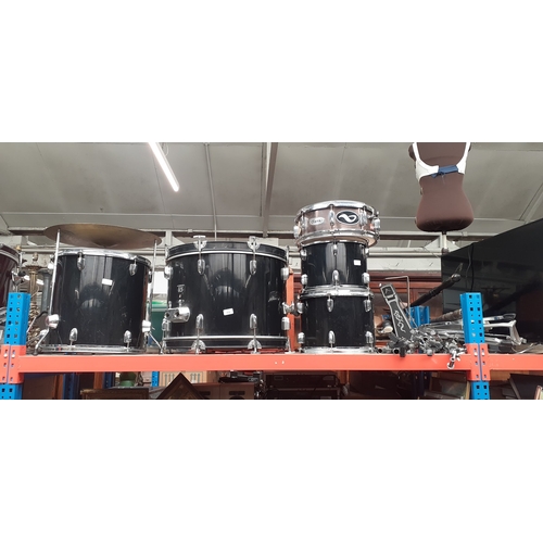 364 - A CB drum kit comprising bass drum, two tom toms and floor tom, two cymbals, hi-hat, pedals and stan... 