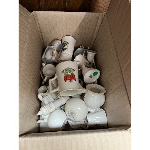 198 - A box of ceramics to include Lladro, Nao, Spode Doulton character jugs, etc. and a box of crested wa... 