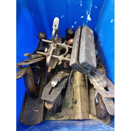 291 - A box of planes including Record, Stanley, etc, six in total together with an oil stone sharpener.