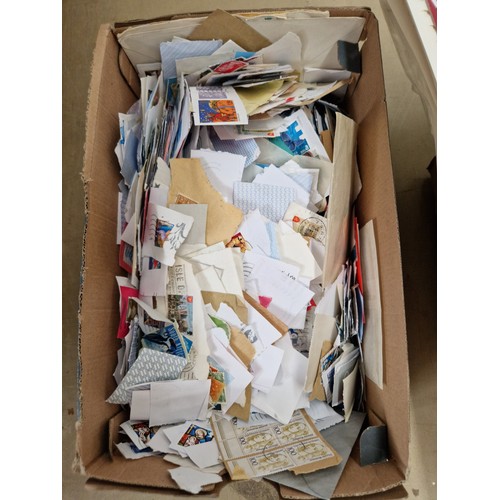 347 - A box of loose stamps, a box of magazines and a box of supplementary sheets.