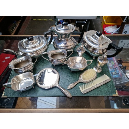 181 - A large quantity of plated ware in two boxes including coffee pots, tray, punch bowl etc