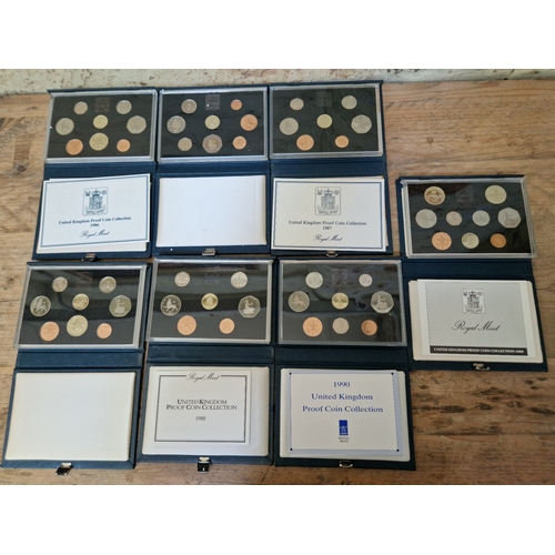 64 - A collection of 7 UK proof coin sets 1984 -1990.