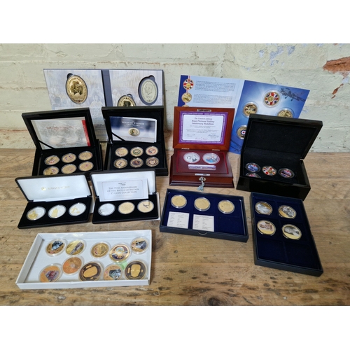 71 - A group of assorted plated proof coins & sets to include the first world war centenary crown collect... 