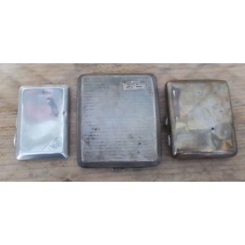 123 - A group of three hallmarked silver cigarette cases, gross wt. 8.8ozt.