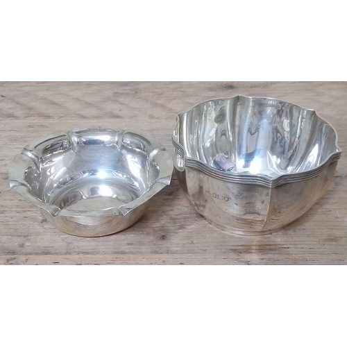 124 - Two hallmarked silver dishes, gross wt. 8ozt.