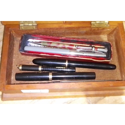 401 - A box of assorted vintage pens and pencils including two with nibs marked '14ct'.