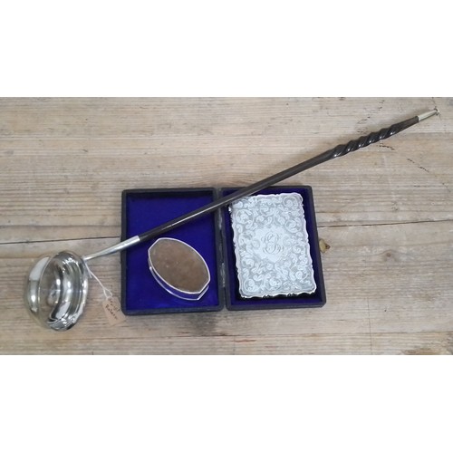 405 - A cased hallmarked silver card case, a hallmarked silver pin cushion and a twist baleen punch ladle ... 